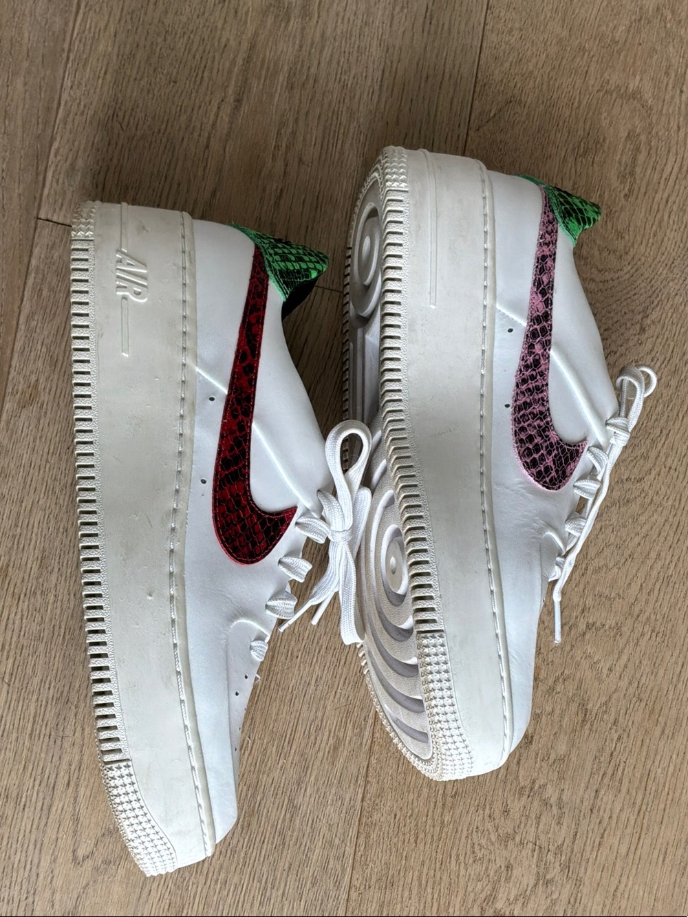 White Nike Air Force 1s with Red & Pink Snakeskin Swooshes and Green Heel